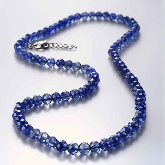 Long sapphire beaded necklace highlights the favorite Libra birthstone.
