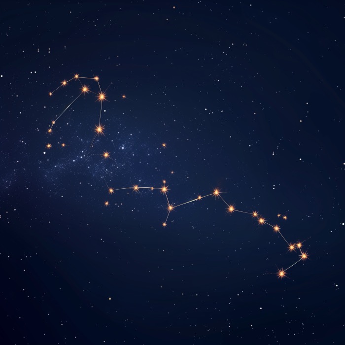 Aquarius Zodiac Sign seen as star constellation in dark blue night sky.