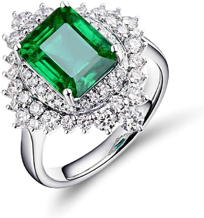 An elaborate diamond setting for a large emerald cut emerald is an example of exquisite luxury emerald jewelry.